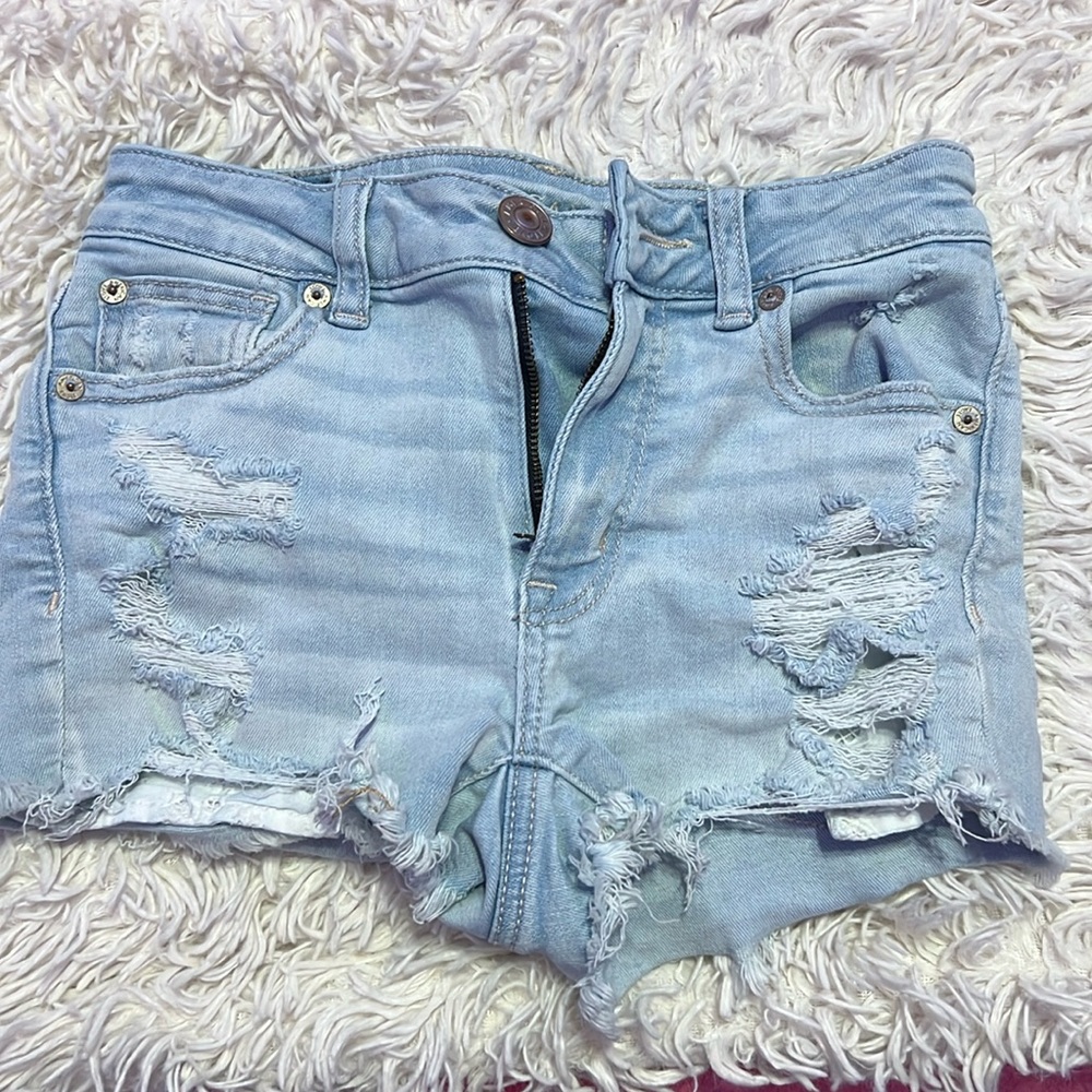 American Eagle next level stretch ripped light wash jean shorts size 00